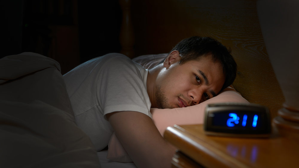 Man Suffering from Insomnia